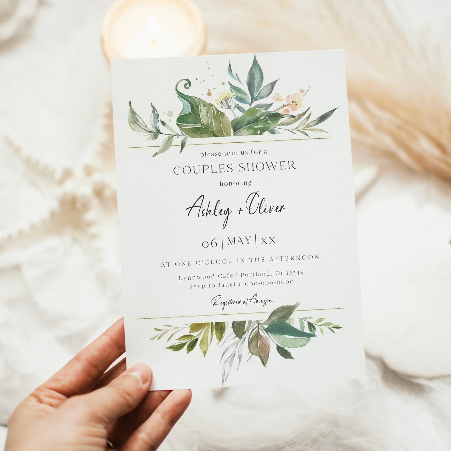 Greenery botanical couples shower invitation template with watercolor tropical leaves, gold line borders, and peach floral accent, editable in Canva