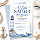 Little sailor nautical baby shower invitation with a lighthouse, sailboat, and ocean waves in navy and light blue